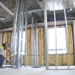 USALSA

FORT BELVOIR, Va. -- Lino Romo, a framer with Precision Drywall, installs a section of steel track while working at the U.S. Army Legal Services Agency (USALSA) headquarters facility project site here May 14, 2011. The U.S. Army Corps of Engineers Baltimore District is managing design and construction of the new facility as part of Base Realignment and Closure 2005 programs here. The USALSA facility, which will also house offices of the U.S. Army Audit Agency, is scheduled to open later this year. (U.S. Army Corps of Engineers photo by Marc Barnes)